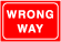 highway sign saying wrong way