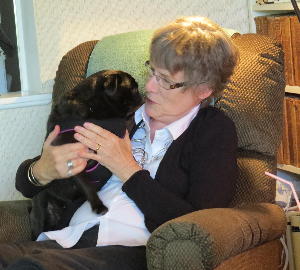 Louise with Daisy the Black Pug