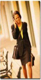 modern business woman with cell phone and attache case