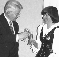 Far left: Ambassador of Finland Veijo K. Sampovaara toasts Sheila Embleton, Associate Dean of Arts and recipient of the Knight, First Class, of the Order of the White Rose of Finland.