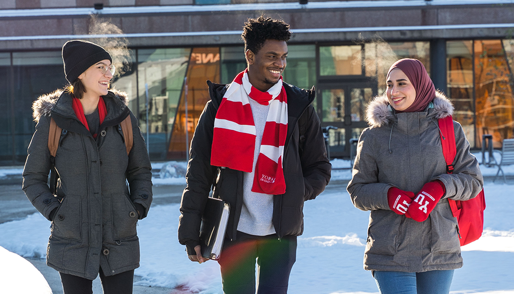 Three York students walking past the subway station on campus