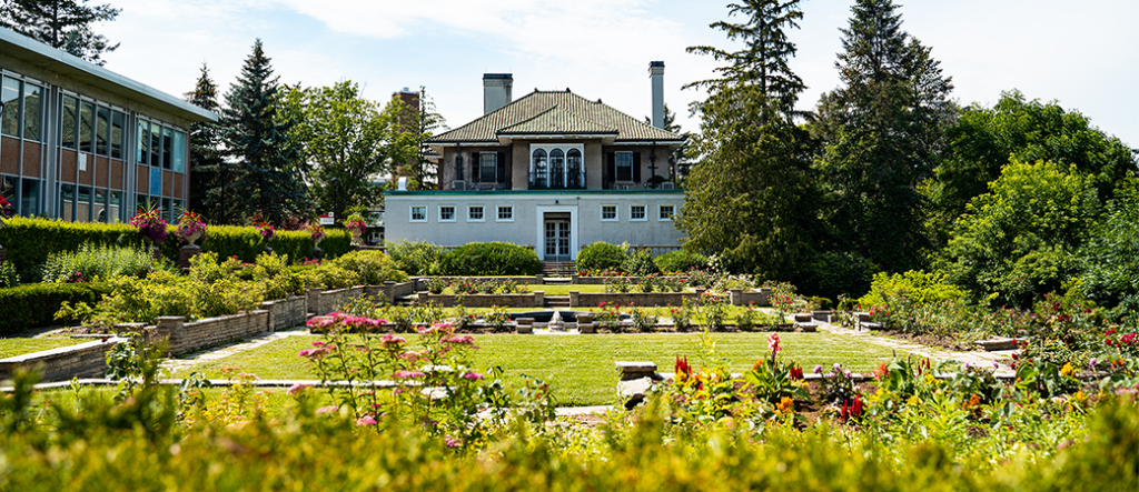 View of the Bruce Bryden rose garden on York's Glendon Campus facing Glendon Hall
