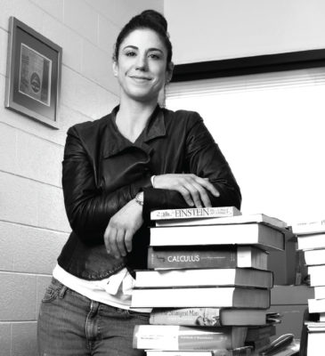 woman leaning on books