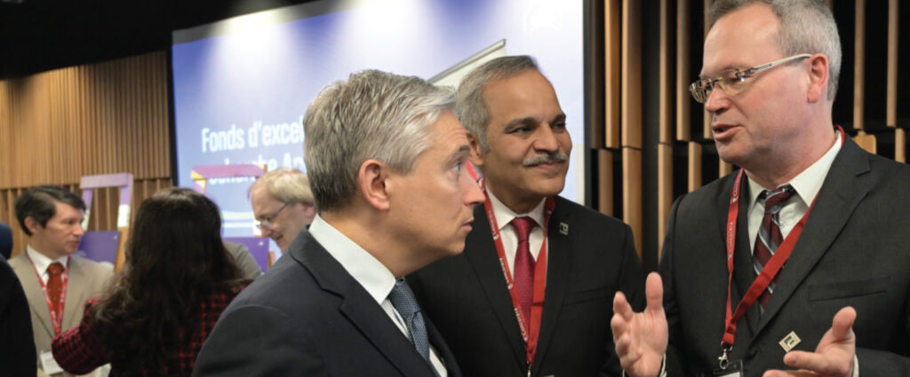 Connected Minds Scientific Director Doug Crawford speaks to the Honourable François-Philippe Champagne Minister of Innovation, Science and Industry at the CFREF announcement in Montreal. From left to right: Minister Champagne, VP Research & Innovation Amir Asif, Doug Crawford. 