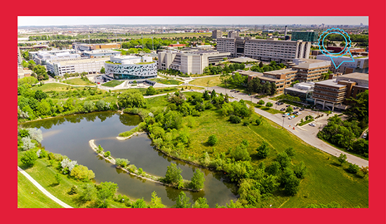 A aerial shot of the York University Keele campus featuring the Bergeron Building and lake with greenery