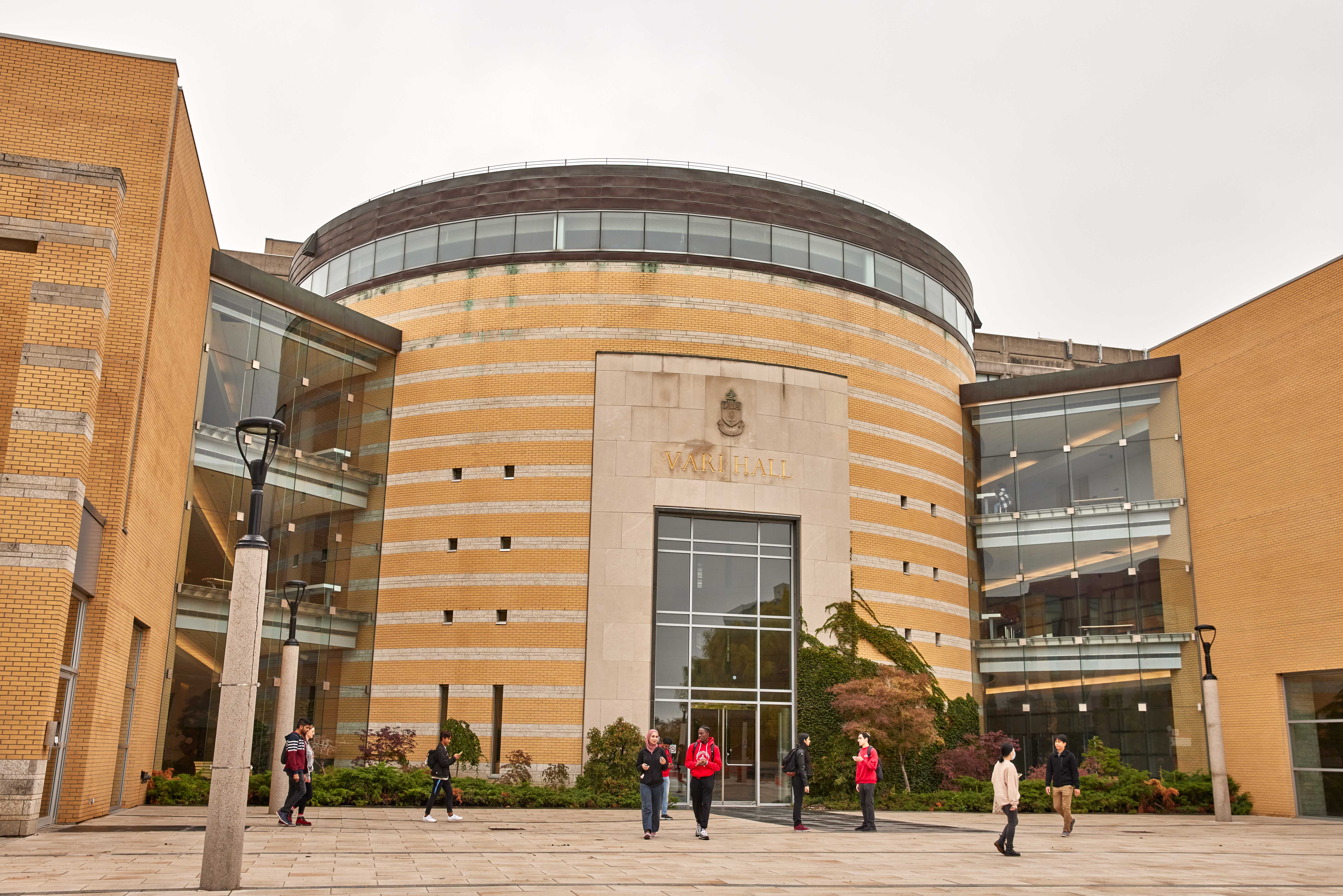 Vari Hall exterior with students walking in front