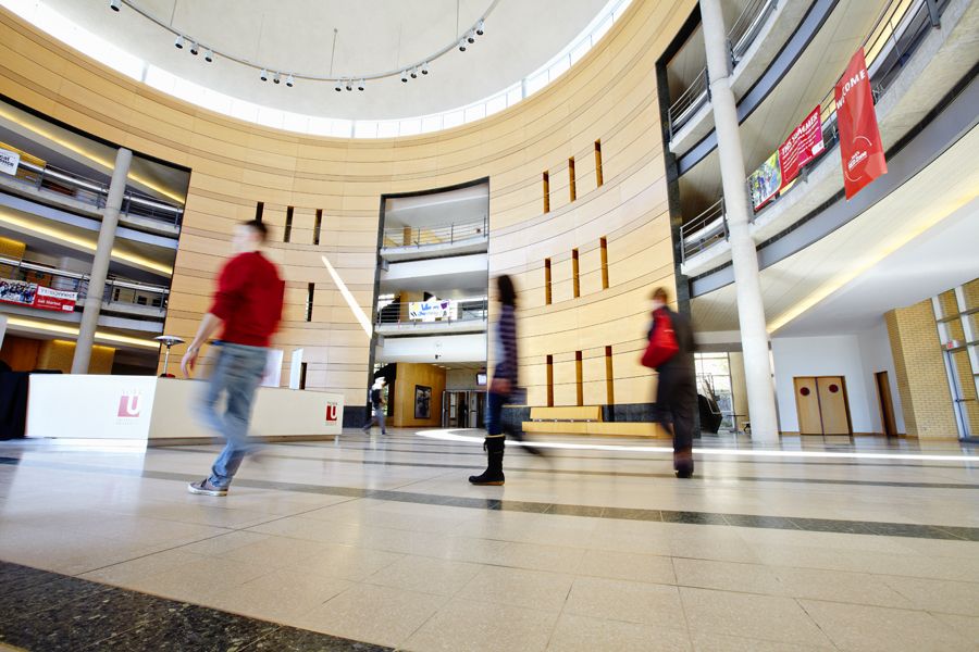 students walking through Vari Hall rotunda on York U Keele campus