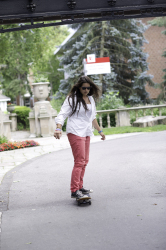 Glendon_student-on-skateboard