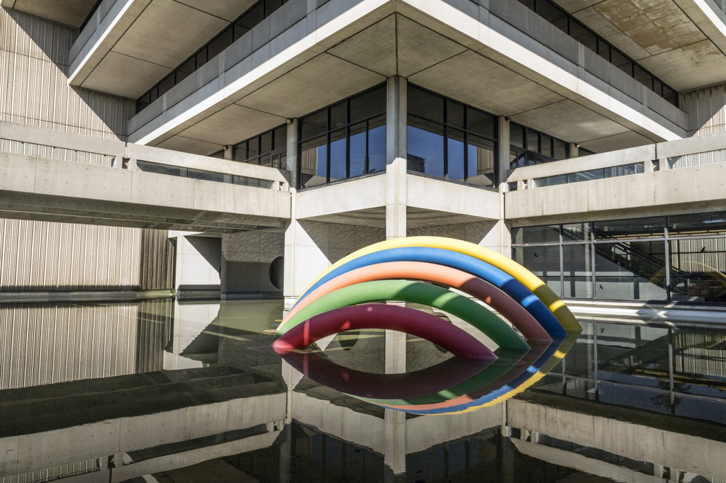 A rainbow-coloured sculpture outside of Scott Library.