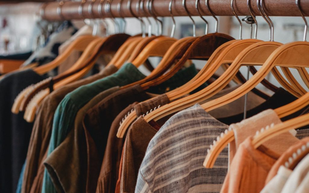 Hangers with clothes on rack