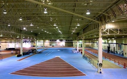 Indoor track and field facility showing running track