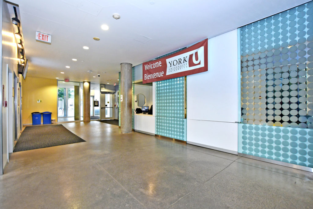 Lobby of Pond Road Residence showing entrance and front desk