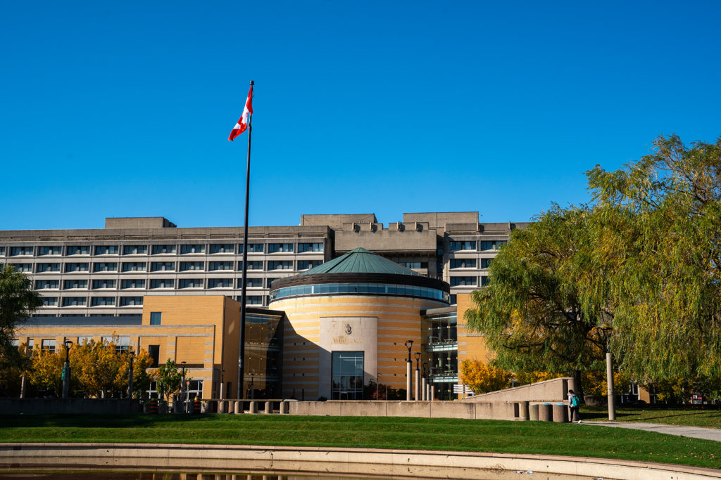 Outside image of Vari Hall in summer