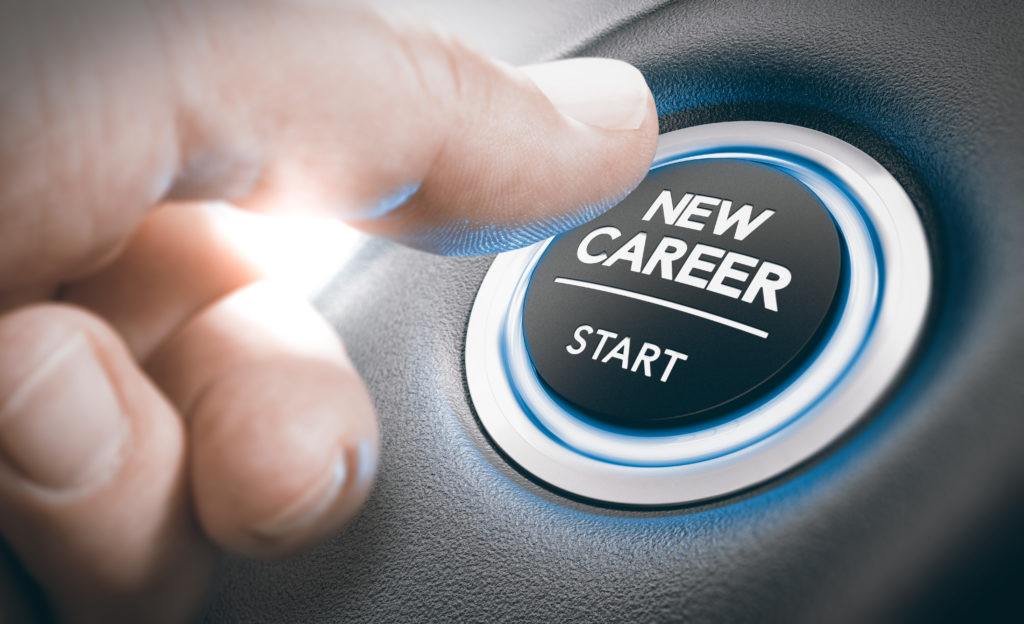 Finger pressing a new career start button.