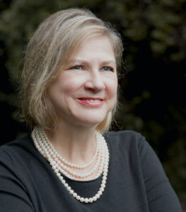 headshot of Professor Sandra Schecter smiling