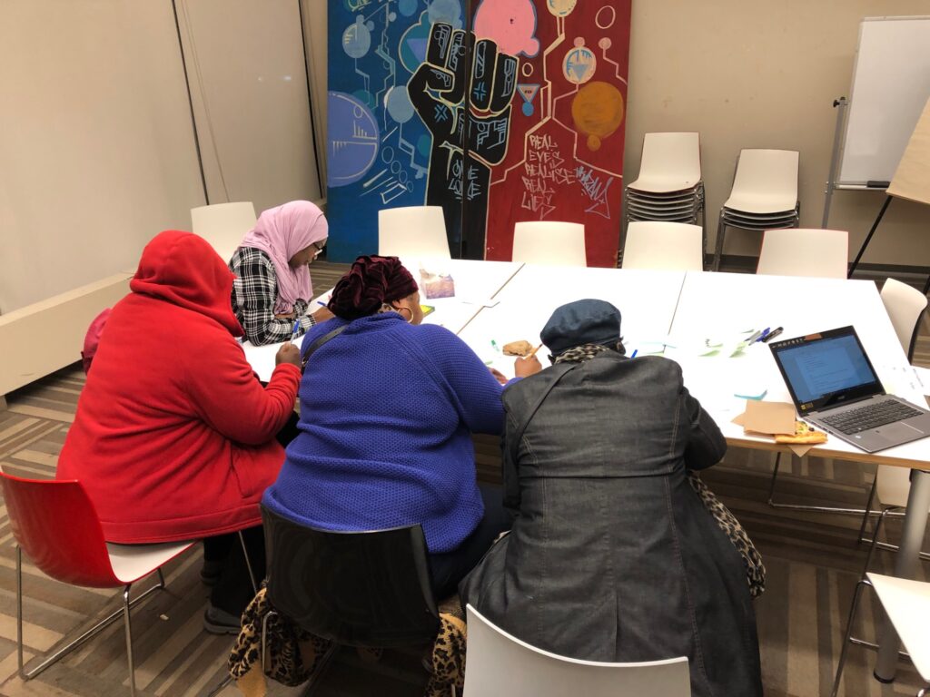 Members of Mothers of Peace – Regent Park working on a project