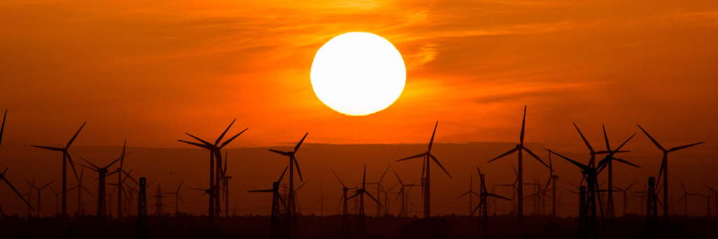 multiple sustainable power pexels under a stunning orange sunset