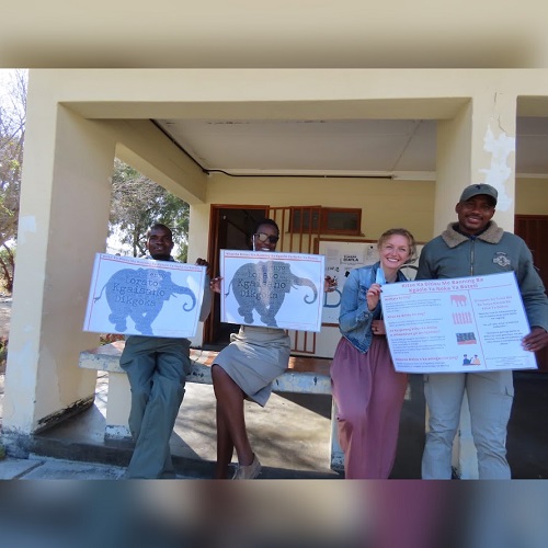 people carrying poster in hand