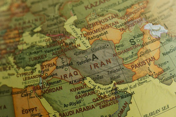 Picture of a globe map with Iran in the focus