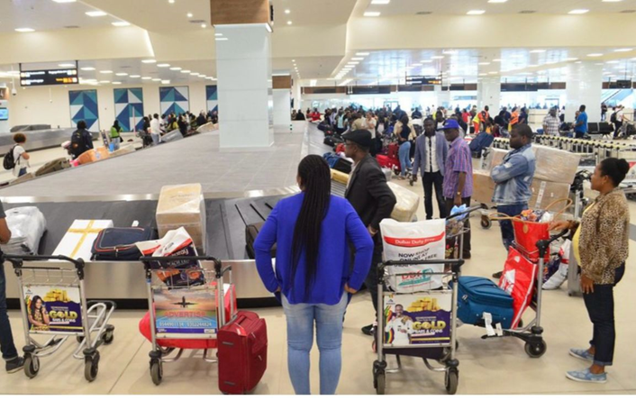 Ghanaians in the diaspora at arrival hall of Kotoka International Airport, Ghana, 2023.