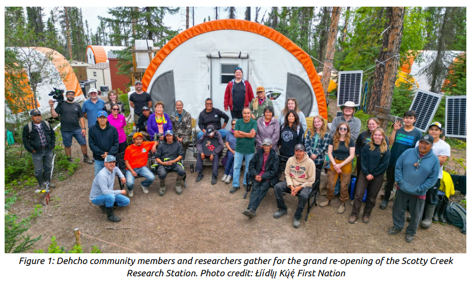 people outside tent in forest or camping area