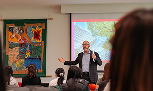 EUC Associate Dean speaking at an event