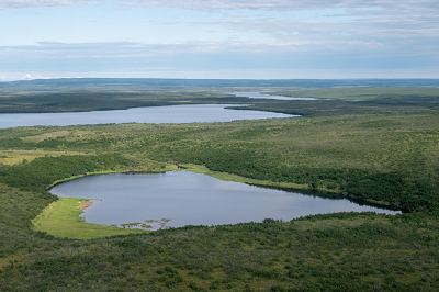 Photograph of the study lake, 2B, taken in July 2023, showing partial drainage. The lake appears to be slowly re-filling, compared to satellite photos from 2012 and a visit in 2017 when water level was lower.