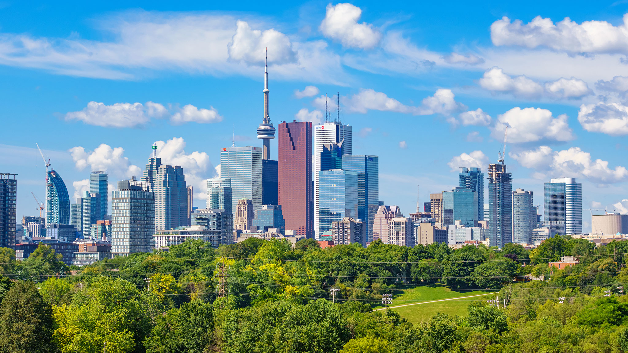 Photo of the skyline of downtown Toronto Ontario Canada on a sunny day.