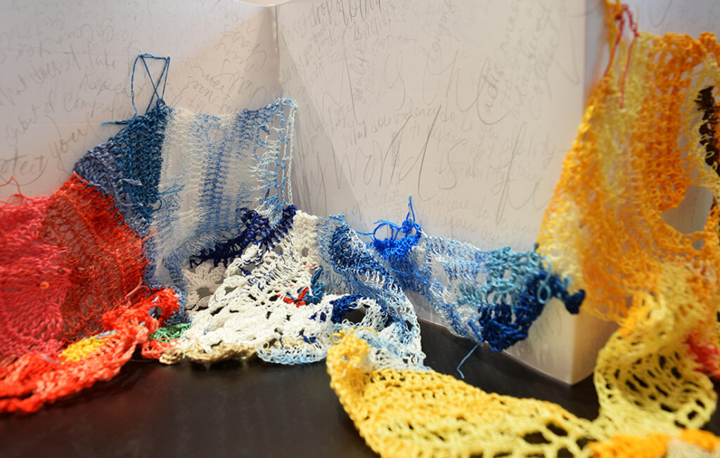 knitted items displayed on a table