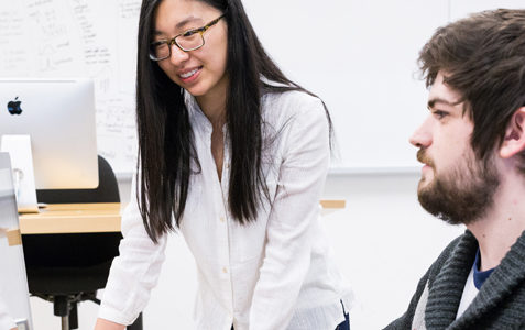 Photo of Two Students Working