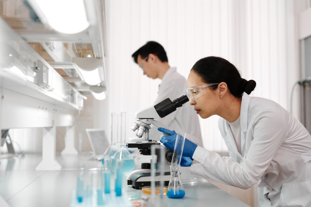 An image of a woman using the microscope