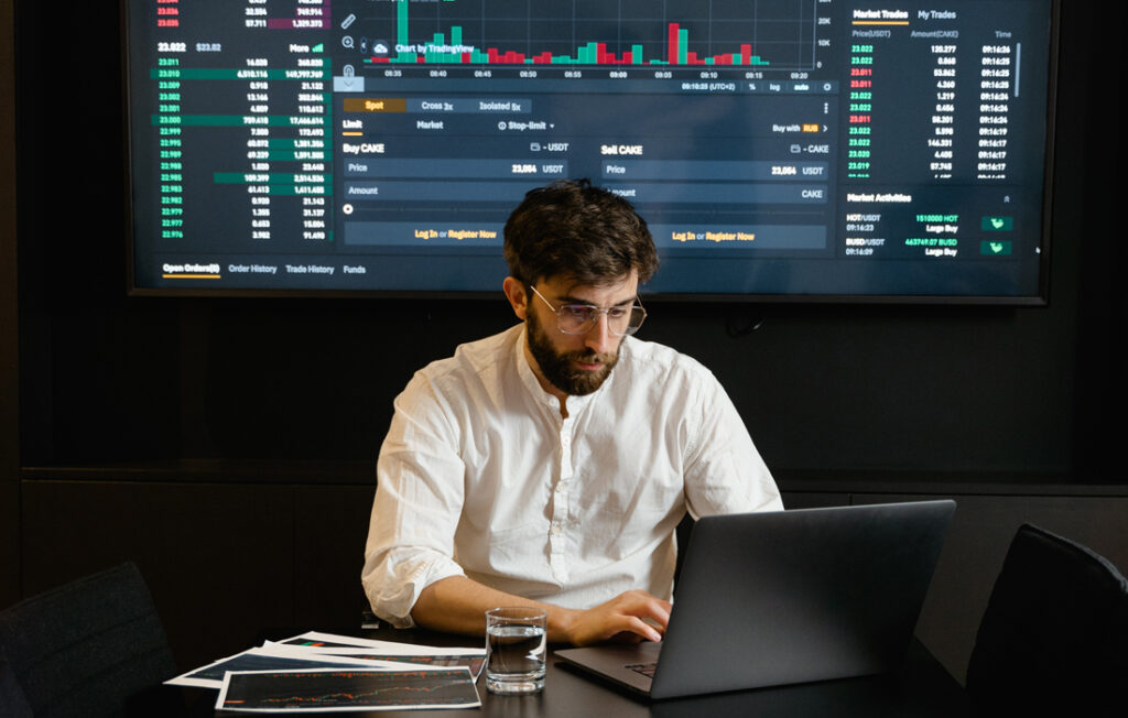 Focused Professional Man using Laptop