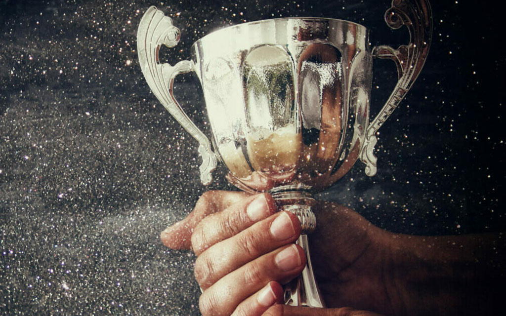 Person Holding a Trophy