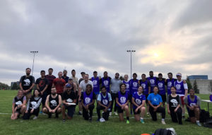 Participants of the Grad Sports League ultimate frisbee challenge assembled for a group photograph