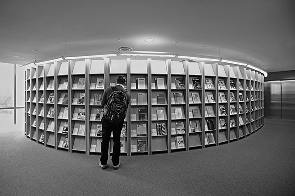 Black and white photo of a library magazine collection