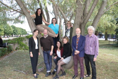 CNS faculty photo 2019 in front of tree