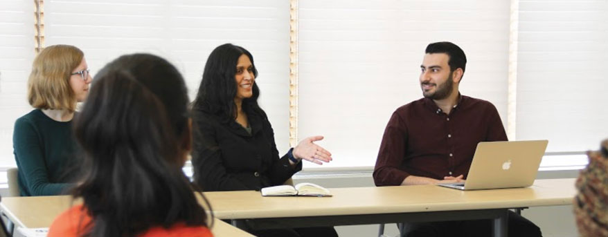 People talking at a psychology conference