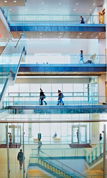 Students walking on the stairs of the Dadaleh building