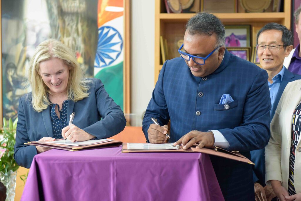 JGU’s Vice-Chancellor Professor C. Raj Kumar and York University's President and Vice-Chancellor Rhonda Lenton signing an agreement