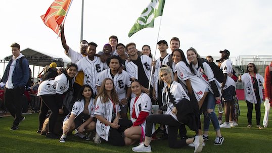 group of students wearing founder's college branded clothes