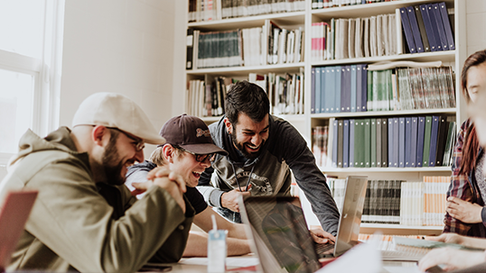 Students learning together in the library