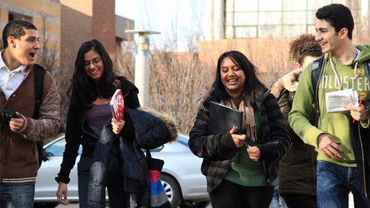 group of students walking together on keele campus