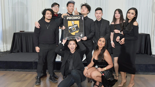 new college student council pose for a photo during an event