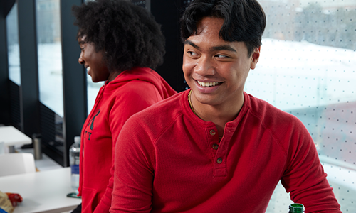 two male students smiling in bergeron building