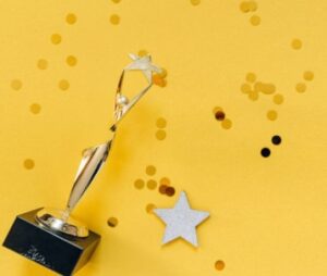 trophy with yellow background with starts