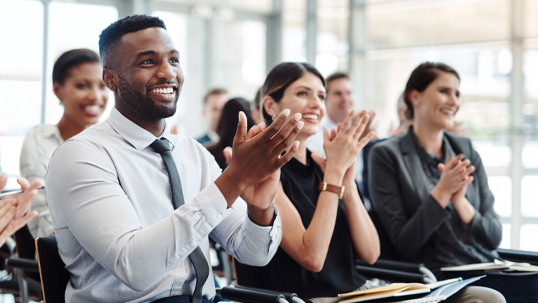 seminar attendees clapping