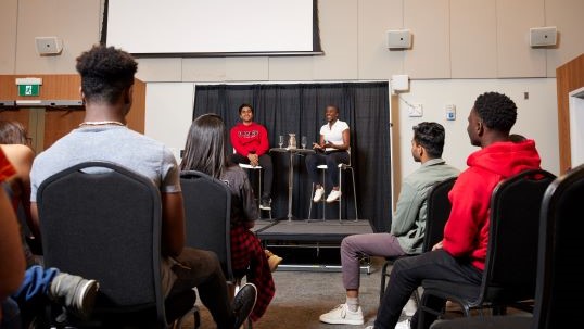 students at a conference