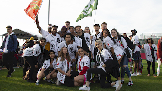 group of students in founder's college branded clothes