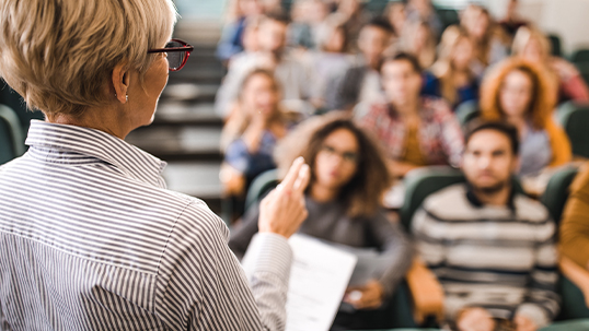 professor lecturing to students