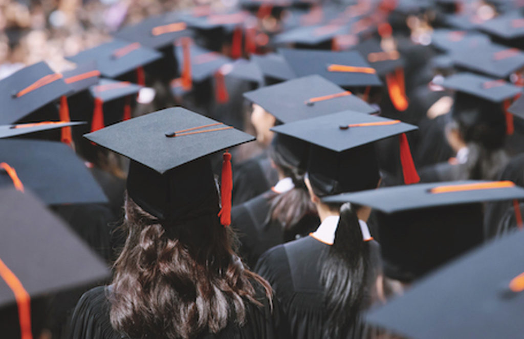 graduates in caps and gowns